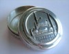 Silver circular vintage pillbox with mosque as silver relief image